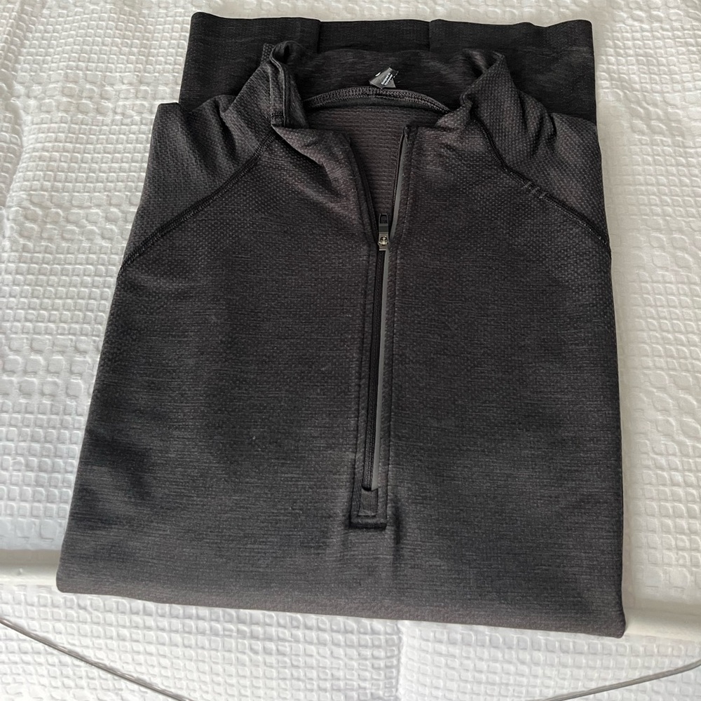Lulu quarter zip.     Very good condition.   Original cost 110.   Size large